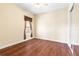 Cozy bedroom featuring wood floors and a window at 9178 Panzani Pl, Windermere, FL 34786