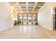 Bright living room with a coffered ceiling, fireplace, and large windows at 9178 Panzani Pl, Windermere, FL 34786