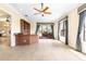 Game room or entertainment area with tile floors, a bar, and large windows at 9178 Panzani Pl, Windermere, FL 34786