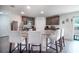 Modern kitchen with a breakfast bar and stainless steel appliances at 936 Dandridge Dr, Deltona, FL 32725