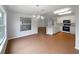 Bright kitchen with stainless appliances, modern island, and cozy dining area bathed in natural light at 9665 Se 125Th Ln, Summerfield, FL 34491