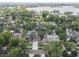 Drone view of the property and neighborhood, showcasing the home's location in a beautiful setting at 1020 Mayfield Ave, Winter Park, FL 32789