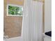 Bathroom featuring a bathtub and a shower at 1020 Mayfield Ave, Winter Park, FL 32789