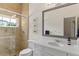 Modern bathroom with shower, sleek vanity, and contemporary mirror at 1020 Mayfield Ave, Winter Park, FL 32789