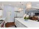 Spacious kitchen with a large island, stainless steel appliances, and open access to the living area at 1020 Mayfield Ave, Winter Park, FL 32789