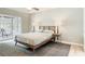 Primary bedroom featuring sliding glass doors and contemporary decor at 1025 Winter Springs Blvd, Winter Springs, FL 32708