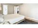 Serene main bedroom with ensuite bathroom entrance and neutral decor at 1025 Winter Springs Blvd, Winter Springs, FL 32708