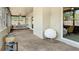 Covered patio featuring neutral walls, an area for dining, and sliding glass doors to the home's interior at 1025 Winter Springs Blvd, Winter Springs, FL 32708