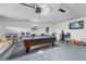 Game room with pool table and laundry at 1065 Jason Ridge Ct, Kissimmee, FL 34747