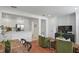 Open floor plan showcasing the living room connected to a kitchen with stainless steel appliances at 1068 Lake Baldwin Ln, Orlando, FL 32814
