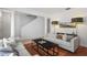Cozy living room with neutral paint, hardwood floors, and lots of natural light at 1068 Lake Baldwin Ln, Orlando, FL 32814