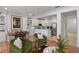 Inviting living room with an open concept view to the kitchen and dining areas, plus neutral decor at 1068 Lake Baldwin Ln, Orlando, FL 32814