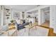 Comfortable living space showcasing open floor plan, built-in shelves, and modern kitchen at 1068 Lake Baldwin Ln, Orlando, FL 32814