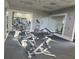Well-equipped fitness center with machines and mirrors at 107 Vista Verdi Cir # 237, Lake Mary, FL 32746