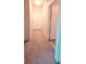 Carpeted hallway with doors leading to other rooms at 107 Vista Verdi Cir # 237, Lake Mary, FL 32746