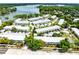 Aerial view of a community showcasing several low rise buildings and parking lots at 1140 S Orlando Ave # E-1, Maitland, FL 32751