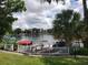 Enjoy a panoramic view of the lake from the community's manicured lawn and boat docks, perfect for relaxation and recreation at 1140 S Orlando Ave # E-1, Maitland, FL 32751