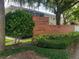 Lake Maitland Terrace sign with address surrounded by lush greenery and landscaping at 1140 S Orlando Ave # E-1, Maitland, FL 32751