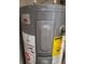 Close-up of a Rheem water heater with detailed labels and components, showcasing modern efficiency at 1140 S Orlando Ave # E-1, Maitland, FL 32751