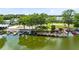 Scenic view of a waterfront community with docks and boat slips on a calm lake at 1140 S Orlando Ave # E-1, Maitland, FL 32751