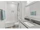 Clean bathroom with white subway tiles, modern fixtures, and a bathtub with shower at 132 Rosa Bella Vw, Debary, FL 32713