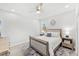 Inviting bedroom with neutral tones, soft lighting, and a cozy bed at 132 Rosa Bella Vw, Debary, FL 32713