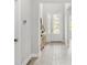Inviting foyer with light wood flooring and a decorative glass front door at 132 Rosa Bella Vw, Debary, FL 32713