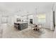 Bright kitchen features a spacious island, stainless steel appliances, and a breakfast nook at 132 Rosa Bella Vw, Debary, FL 32713