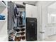 Custom walk-in closet with shelving, clothing racks and a Liberty Safe for secure storage at 132 Rosa Bella Vw, Debary, FL 32713
