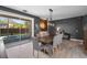 Dining room with an open floor plan with direct access to the pool area at 13214 Triphammer Way, Orlando, FL 32828