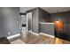 Upstairs hallway leads to additional bedrooms and staircase at 13214 Triphammer Way, Orlando, FL 32828
