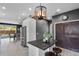 Open kitchen features a center island, stainless steel appliances, and view of the breakfast nook at 13214 Triphammer Way, Orlando, FL 32828