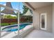 Inviting pool area and comfortable outdoor space at 13214 Triphammer Way, Orlando, FL 32828
