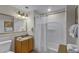 Standard bathroom with a shower-tub combination with a curtain, sink, and mirror at 13415 Blue Heron Beach Dr # 208, Orlando, FL 32821