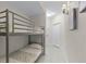 Neutral-toned bedroom with a bunk bed, perfect for or guests, offering comfortable accommodation at 13415 Blue Heron Beach Dr # 208, Orlando, FL 32821