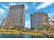 Gorgeous condo buildings offer picturesque waterfront views and a charming boardwalk at 13415 Blue Heron Beach Dr # 208, Orlando, FL 32821