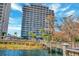 Beautiful resort-style condo building with scenic boardwalk along the waterfront at 13415 Blue Heron Beach Dr # 208, Orlando, FL 32821