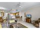 Cozy living room features bar seating, tile floors, and an open floor plan at 13415 Blue Heron Beach Dr # 208, Orlando, FL 32821