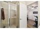 Bathroom featuring glass shower, tile, and neutral paint at 14090 Avenue Of The Groves, Winter Garden, FL 34787