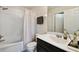 Bathroom featuring a tub and shower combination and neutral colors at 14090 Avenue Of The Groves, Winter Garden, FL 34787