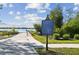 Community boat ramp and dock featuring a waterfront recreation area and informational sign at 14090 Avenue Of The Groves, Winter Garden, FL 34787