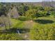 Aerial view of a fenced dog park featuring agility equipment and green space at 14090 Avenue Of The Groves, Winter Garden, FL 34787