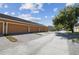 Exterior of townhome with a driveway at 14090 Avenue Of The Groves, Winter Garden, FL 34787
