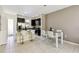 Eat-in kitchen features stainless steel appliances and a dining area with seating at 14090 Avenue Of The Groves, Winter Garden, FL 34787
