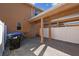 Covered patio with brick floors and exterior wall of home at 14090 Avenue Of The Groves, Winter Garden, FL 34787