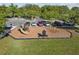 Community playground with slide, parking lot, and shade trees at 14090 Avenue Of The Groves, Winter Garden, FL 34787