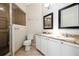 This bathroom features dual sinks with granite countertops and a glass shower at 1413 Timberbend Cir, Orlando, FL 32824