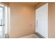 A close view of the light tan colored entryway and bright white front door at 1413 Timberbend Cir, Orlando, FL 32824