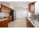 Well-appointed kitchen featuring granite countertops and stainless steel appliances at 1413 Timberbend Cir, Orlando, FL 32824