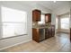 Well-lit kitchen features stainless steel appliances, stone countertops, and mosaic tile backsplash at 1413 Timberbend Cir, Orlando, FL 32824